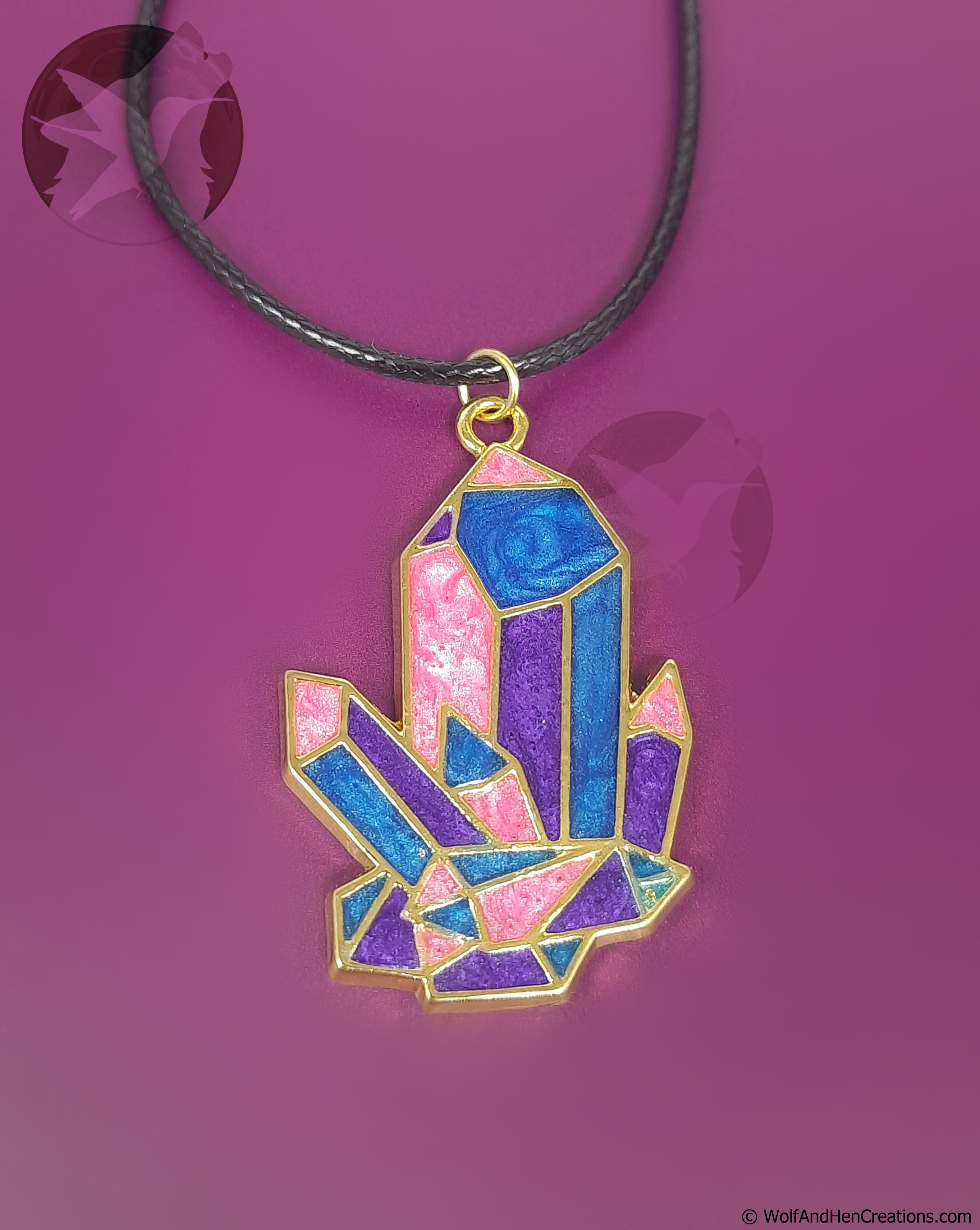 Necklace with a colorful crystal pendant on a purple background